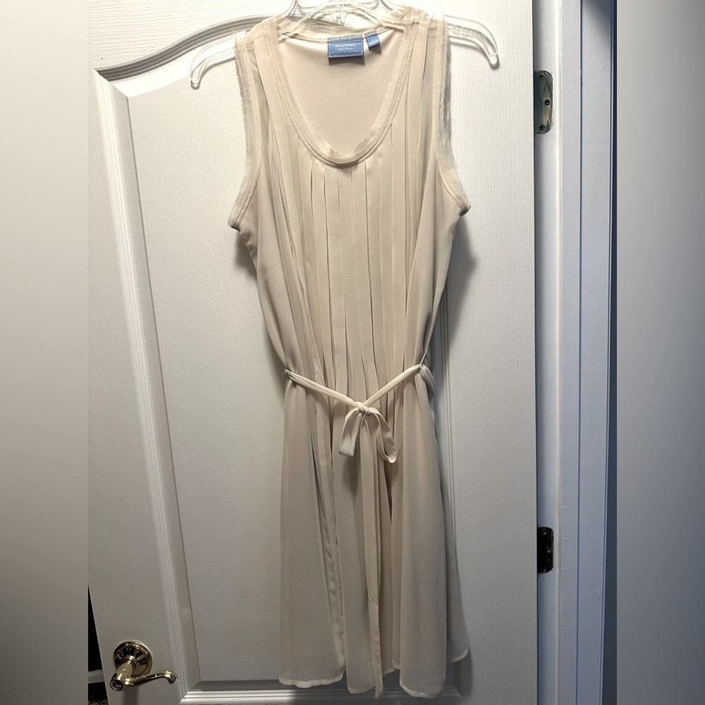 Off-white dress with tuxedo pleating